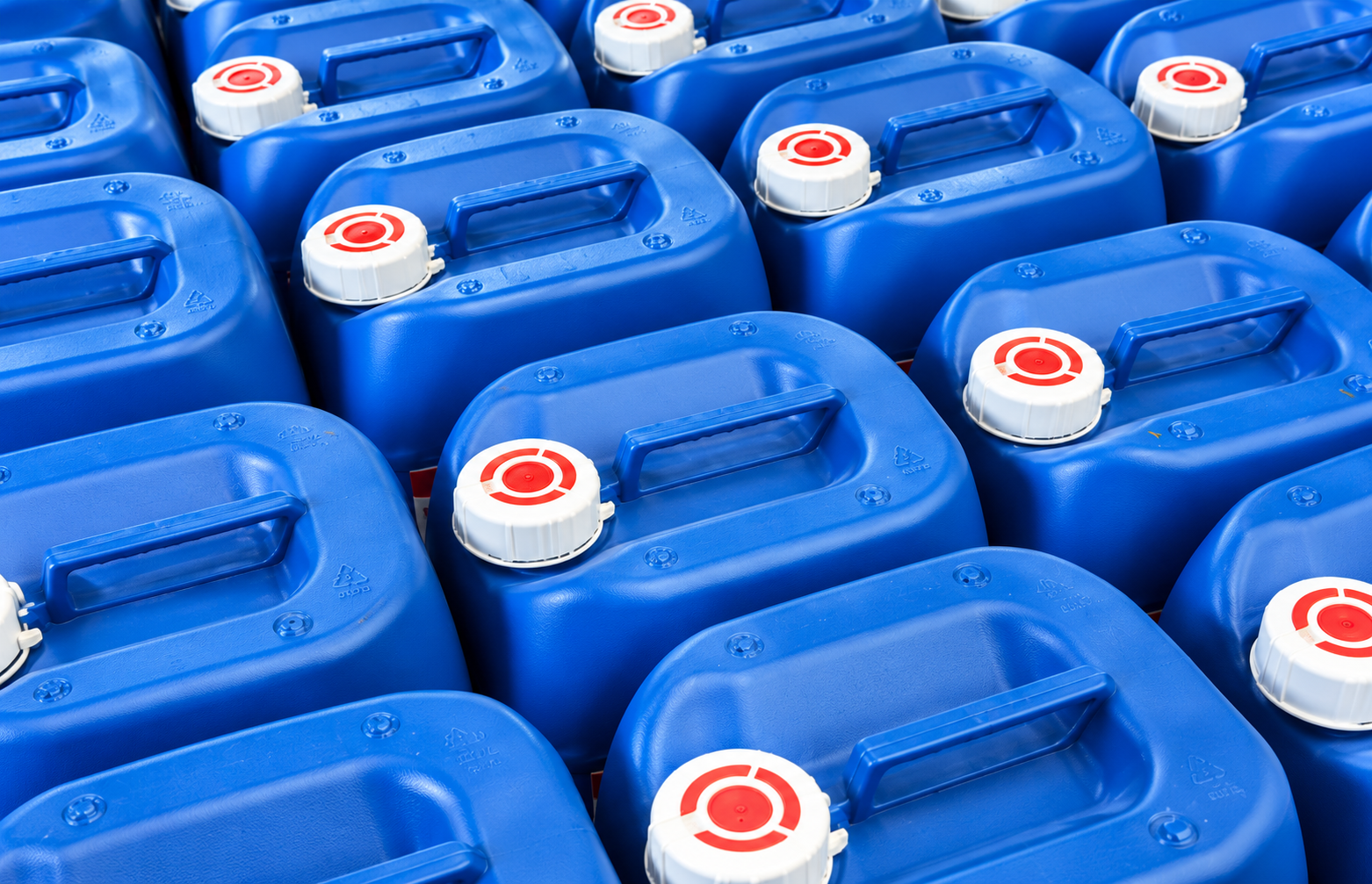stacked blue industrial jerrycans